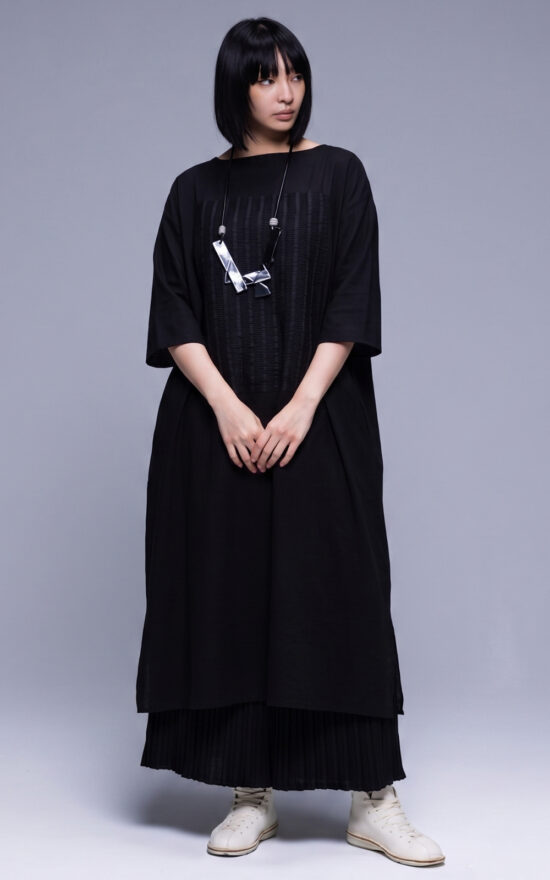 Undulatus Patch Dress product photo.