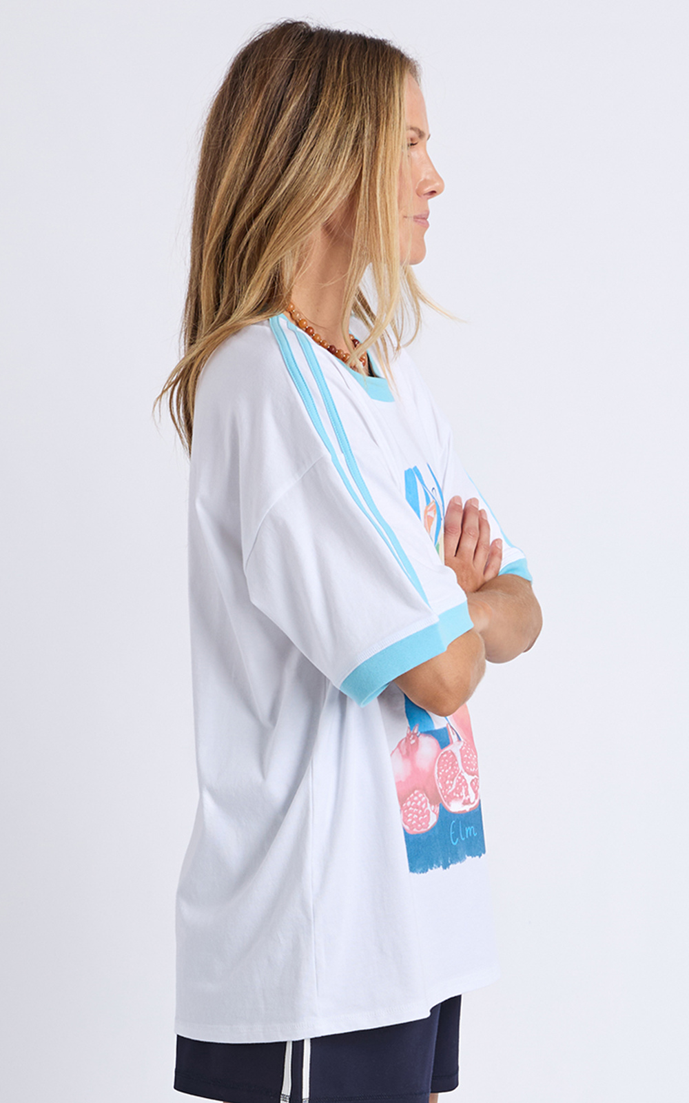 Saluti Tee product photo.