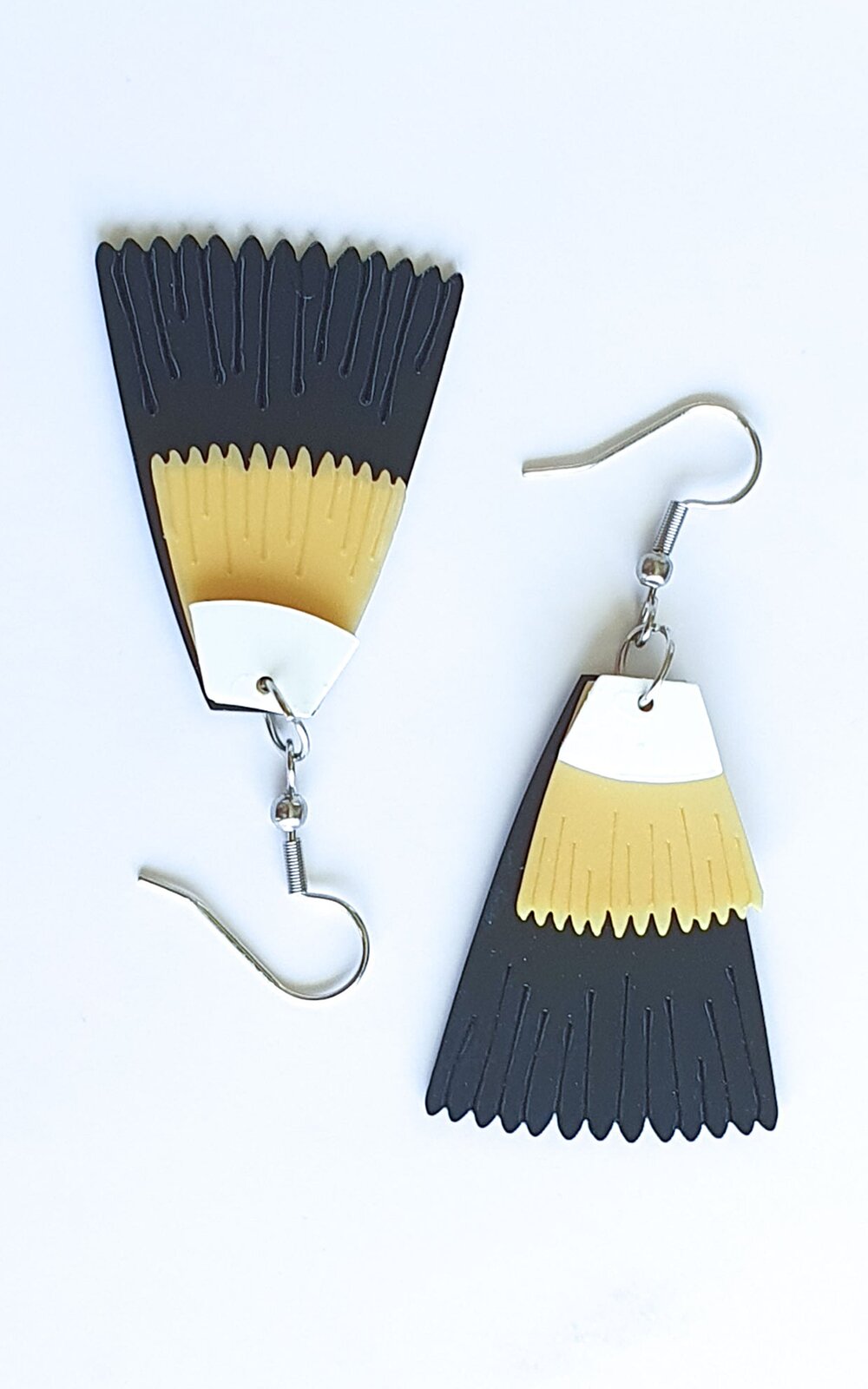 Bird Of The Century Earrings product photo.