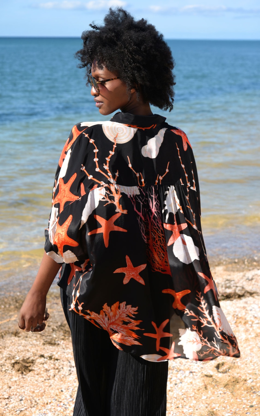 Behind Her Back Shirt product photo.