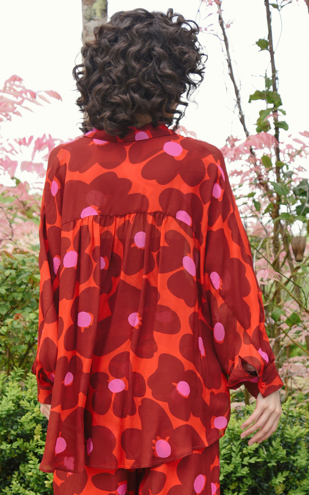 Behind Her Back Shirt product photo.