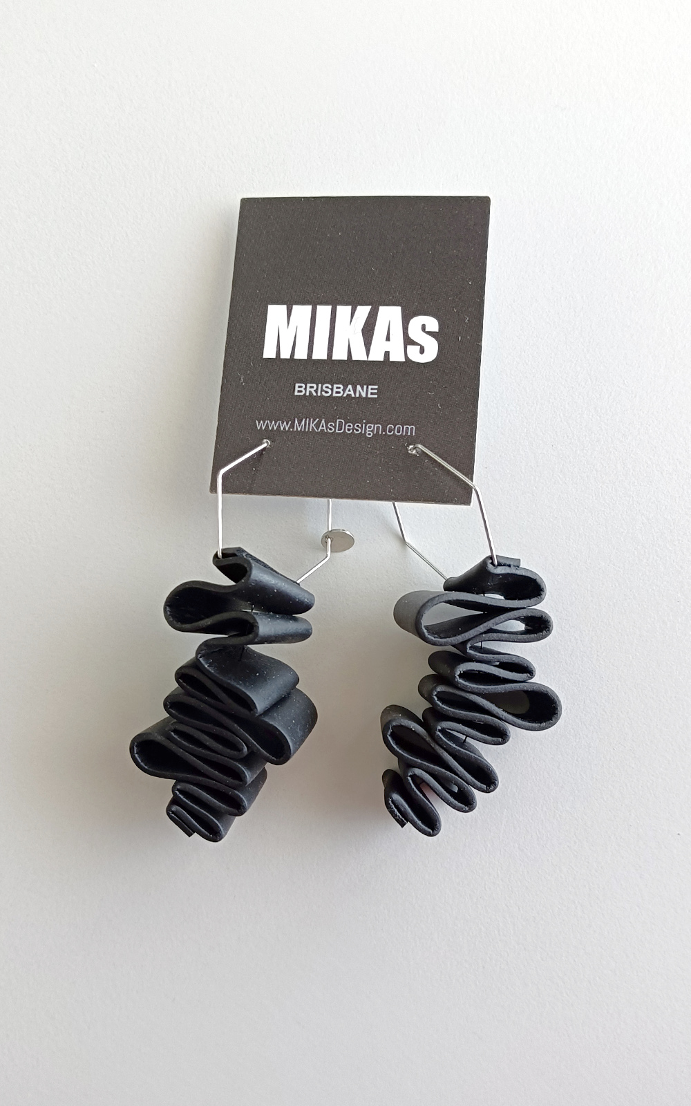 Kune Earrings product photo.