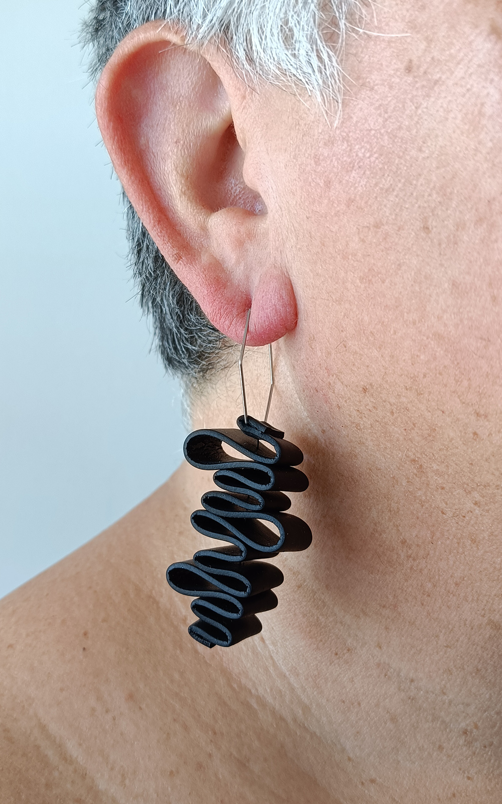 Kune Earrings product photo.