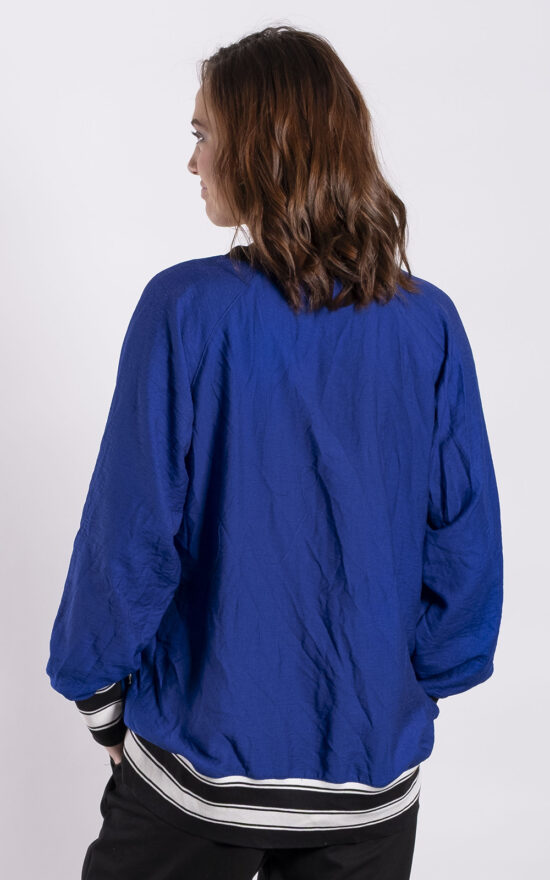Team Sweater Top product photo.