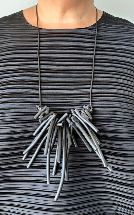 Piano Necklace product photo.