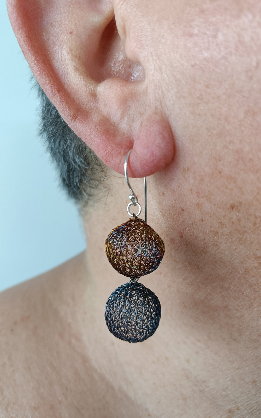Twin Ball Medium Earrings product photo.