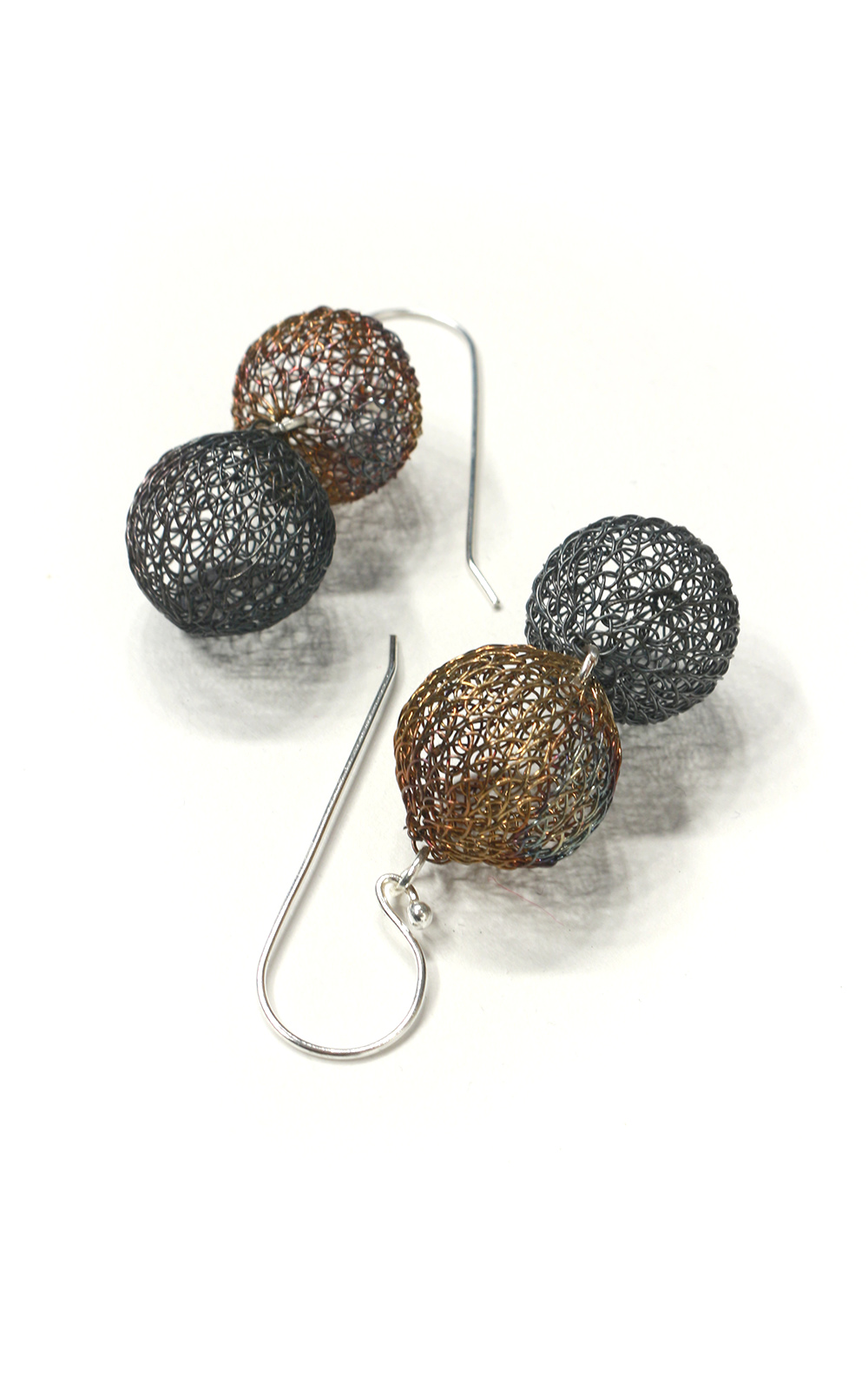 Twin Ball Medium Earrings product photo.