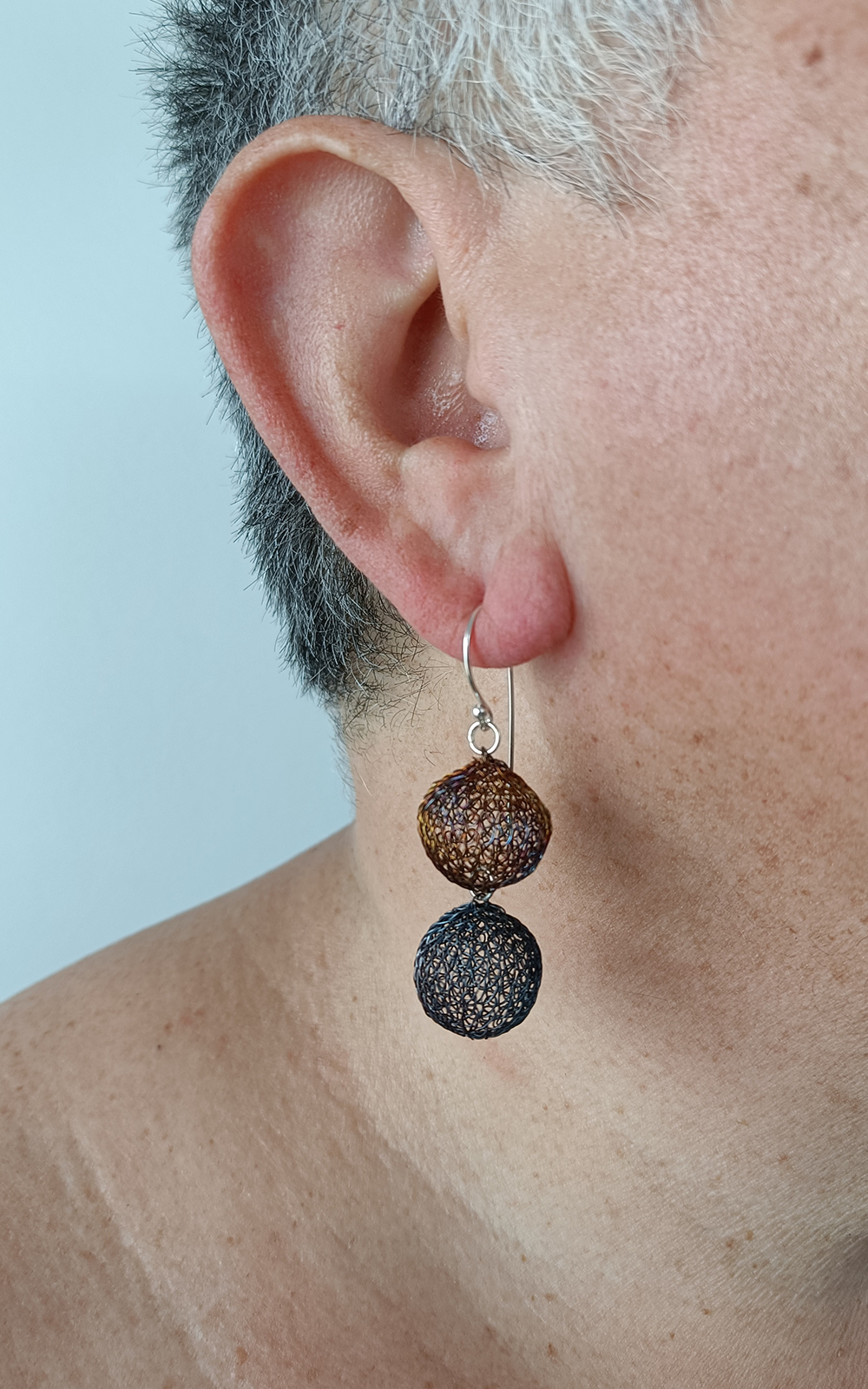 Twin Ball Medium Earrings product photo.