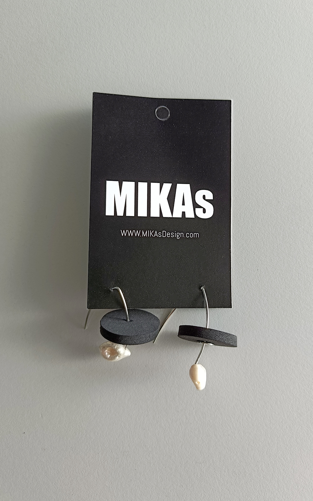 Ten Earrings product photo.